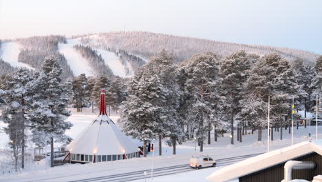 Snow-Covered-Roof-Of-Swedish-Restaurant-On-Wintery-Landscape-Of-Arvidsjaur-In-Sweden