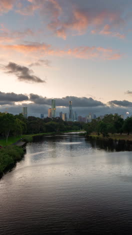 Vertical-4k-Timelapse,-Melbourne-Australia-Cityscape-Skyline-View-From-Botanical-Garden-Over-Lake