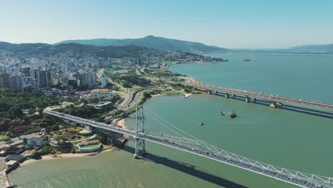 Bird's-eye-view-of-the-Hercílio-Luz,-Colombo-Salles,-and-Pedro-Ivo-bridges-in-Florianopolis