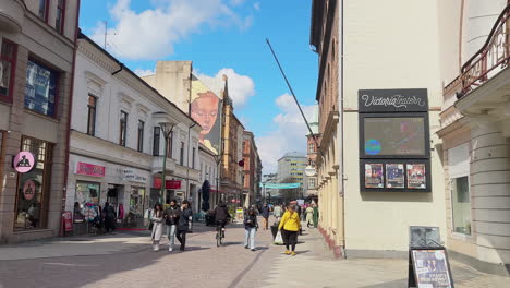 Scene-Of-People-Walking-On-The-Shopping-Streets-Along-Södra-Förstadsgatan-In-Malmo,-Sweden