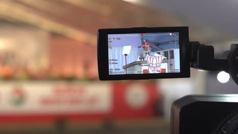 Closeup-of-Indian-Prime-Minister-Narendra-Modi-being-captured-by-Video-journalists,-press,-and-media-during-the-Indian-Lok-Sabka-Election-Campaign-speech-at-Race-Course,-Pune,-Maharashtra