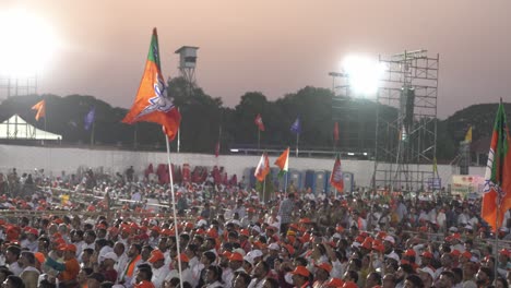 Indian-Prime-Minister-Narendra-Modi-supporters-with-BJP-political-flags-and-symbols-during-Lok-Sabha-election-campaign