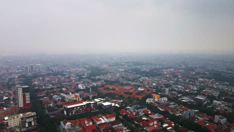 morning-bustling-in-Surabaya,-one-of-the-most-densely-population-In-Indonesia-and-yet-diverse,-potraying-development-and-urbanization,-reflecting-its-status-as-a-bustling-economic-and-cultural-hub