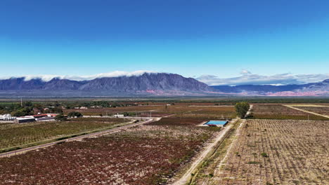 A-stunning-hyperlapse-captured-by-drone-showcases-the-scenic-vineyards-of-Cafayate-against-the-backdrop-of-the-Andes-mountain-range