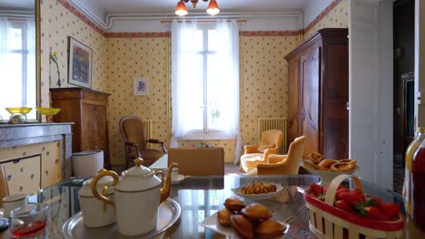 Slow-establishing-revealing-a-set-breakfast-table-within-a-historic-mansion