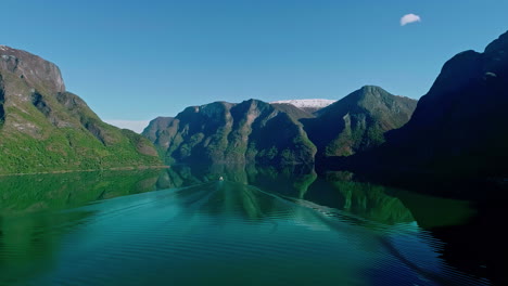 Cruise-ship-as-seen-departing-Flam,-Norway-in-Aurlandsfjord---aerial-overlook