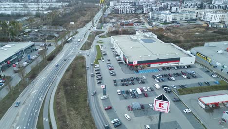 Kaufland-Store-In-Szczecin,-Poland---Aerial-Pullback