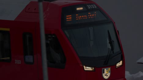 Close-up-shot-of-Rhaetian-Railway-train-coming-into-Davos-Platz-central-train-station