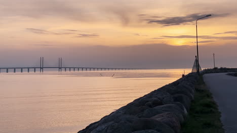 A-Beautiful-Shot-Of-Oresund-Bridge-At-Golden-Hour---Malmo,-Sweden