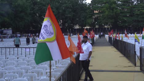Political-flags-during-Lok-Sabha-election-campaign-by-Uddhav-Thackeray-and-Sharad-Pawar-at-college-ground-in-Warje