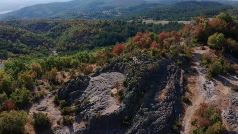 Harman-Kaya,-Ancient-Thrace-Rock-Sanctuary-Surrounded-By-Autumn-Nature-In-Rhodope-Mountain,-Bulgaria