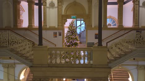 Profile-view-of-Archeology-building-inside-the-main-hall-of-National-museum-of-Ireland-during-Christmas-in-Dublin,-Ireland