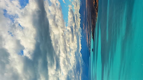 Vertical-orientation-cloudscape-timelapse-over-Lake-Pukaki-on-road-to-Mount-Cook,-New-Zealand