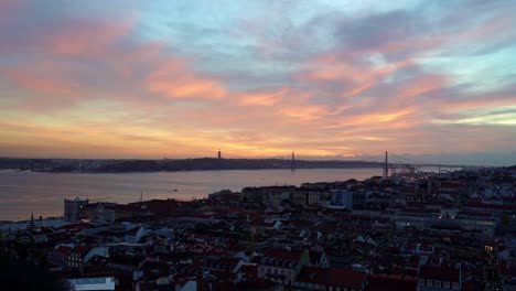 Pink-Clouds-Hovering-Over-The-Tagus-River-In-The-Old-Capital-City-Of-Portugal