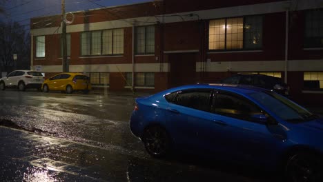 rainy-atlanta-city-street-at-night-parked-cars