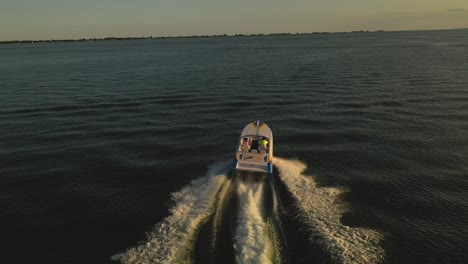 Boats-cruising-across-open-water-on-sunny-summer-day