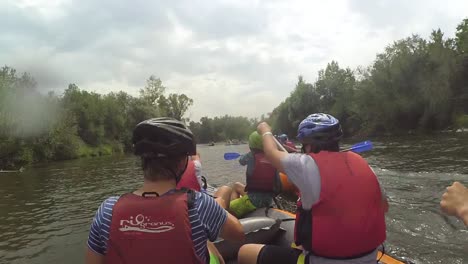 Wet-Raft-Paddling-with-Group-of-Friends,-Togetherness-and-Team-Effort,-POV