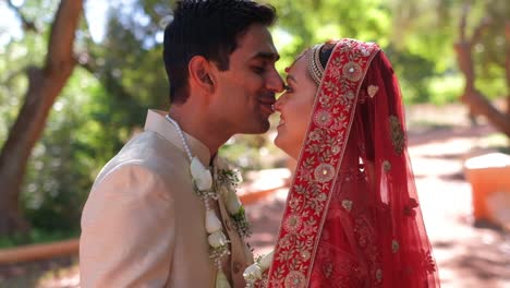 Happy-Indian-Hindu-Groom-And-Bride-During-Wedding-Day---Close-Up