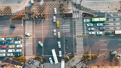 A-Time-Lapse-Shooting-Of-Crowd-At-Crossroads-Intersection-With-Busy-Traffic-Cars-Driving