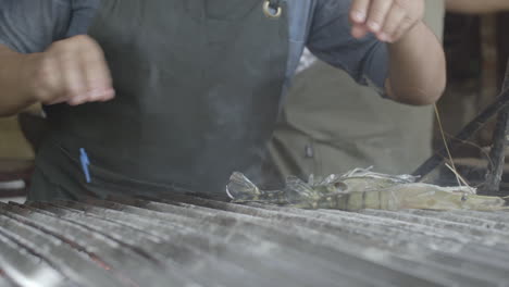 Chef-prepares-an-exquisite-meal-of-seafood-on-the-grill