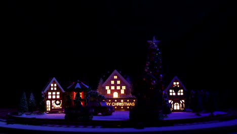 Miniatur-Weihnachtsstadt-Bei-Nacht