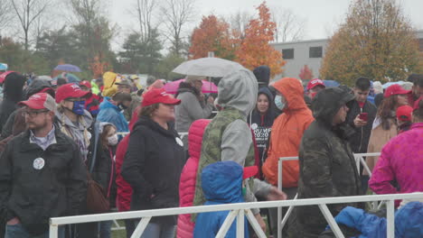 A-crowd-clapping-while-waiting-in-line-to-get-into-a-trump-rally-in-Butler,-Pennsylvania-before-the-2020-election