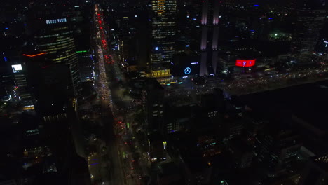 night-top-view-of-building,-aerial-shot