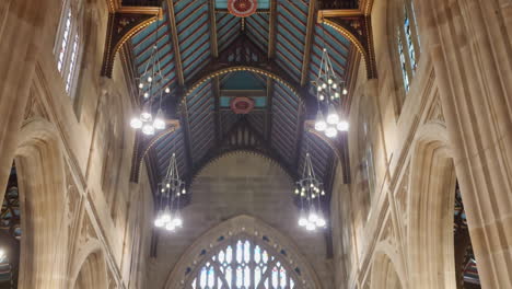 Vertical-traveling-view-of-the-church-dome-with-a-beautiful-and-colorful-religious-stained-glass-window