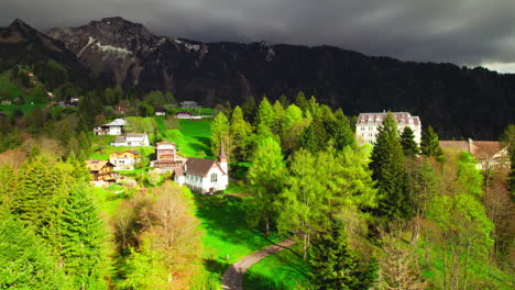 Mountain,-church-and-houses-on-the-hills-of-Montreux,-Switzerland