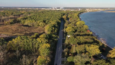 Aerial-drone-view-of-Green-Bay-Wisconsin-nature-preserve-The-Wildlife-Sanctuary-across-the-road-from-houses-along-East-Shore-Drive