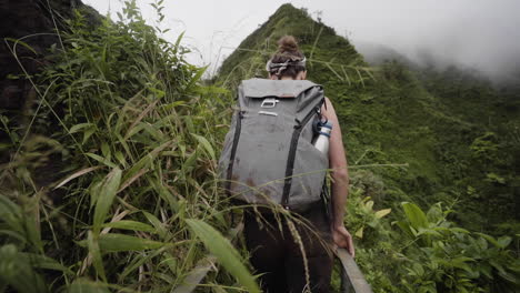 POV-Of-Female-Hiker-Climbing-Haiku-Stairs-In-Oahu,-Hawaii