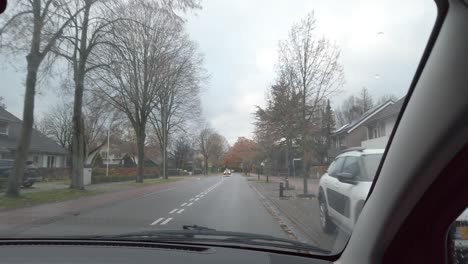 POV-of-inside-the-car-at-passenger-seat-with-windshield-wiper-moving