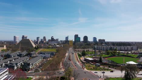 Rising-aerial-drone-shot-revealing-downtown-Sacramento,-California-on-a-sunny-day