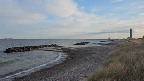 Beach-with-lighthouse-in-Skagen,-Denmark