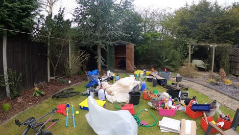 Time-Lapse-of-shed-being-cleared-out-in-English-Garden