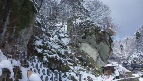 Snow-covered-Mountainside-at-Yamadera-Temple-Complex,-Yamagata-Prefecture-Japan