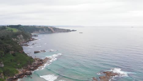 Aerial-shot-of-a-beautiful-rocky-seaside-area