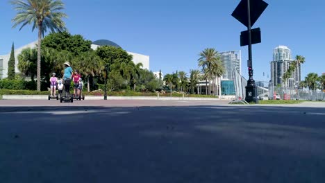 4K-Video-of-Segways-Riding-Past-The-Dali-Museum-in-St-Petersburg,-Florida