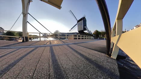 Low-angle-time-lapse-during-river-and-sunset-in-background