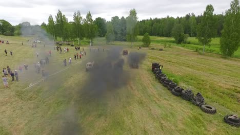 Offroad-mud-rally-with-buggy-in-forests-and-river-aerial-view