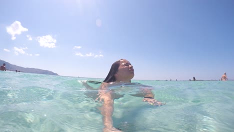 Beautiful-woman-swimming-and-snorkeling-in-the-sea