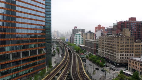 Fixed-Aerial-View-Above-Elevated-Subway-Train-Tracks-in-New-York-City