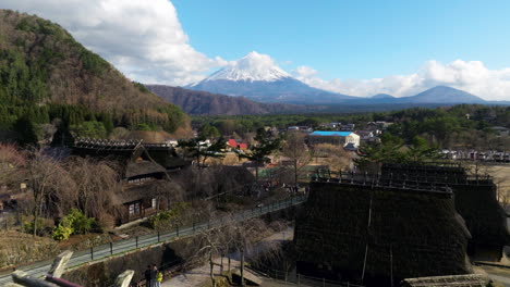 View-Of-Mount-Fuji-From-Saiko-Iyashi-no-Sato-Nenba---Traditional-Japanese-Village-In-Saiko,-Japan