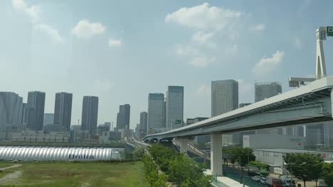 The-view-of-the-city-while-travelling-on-a-train-in-Japan