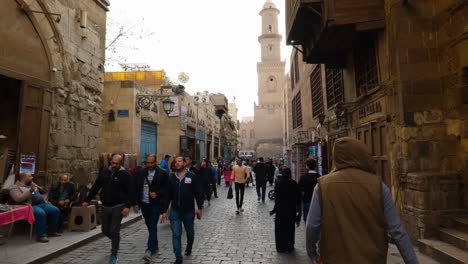 People-Walking-on-Busy-Street-on-Typical-Day-in-Cairo,-Egypt