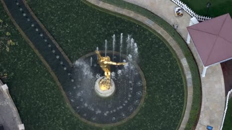 Aerial-above-Americana-at-Brand-bronze-statue-D-Day-Dead-water-fountain-in-Glendale