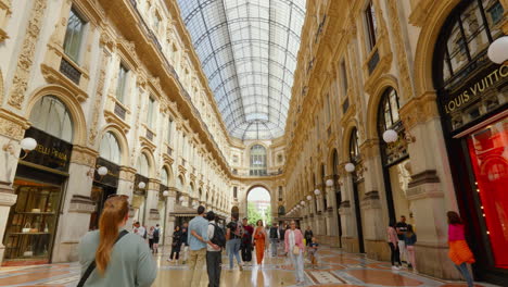 Elegant-gallery-in-Milan-with-shoppers-and-luxury-stores