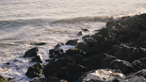 little-waves-break-on-the-pier-in-portugal