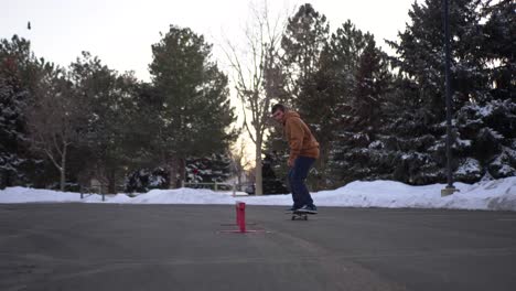 Man-does-a-grind-on-the-rail-during-sunset