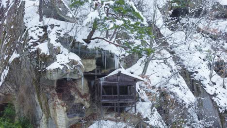 Buddhist-Mountain-Temple-on-Ice-covered-mountainside-in-Yamagata-Japan